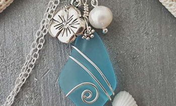 Read more about the article Handmade in Hawaii, wire wrapped blue sea glass necklace, Hibiscus and freshwater pearl, (Hawaii Gift Wrapped, Customizable Gift Message)